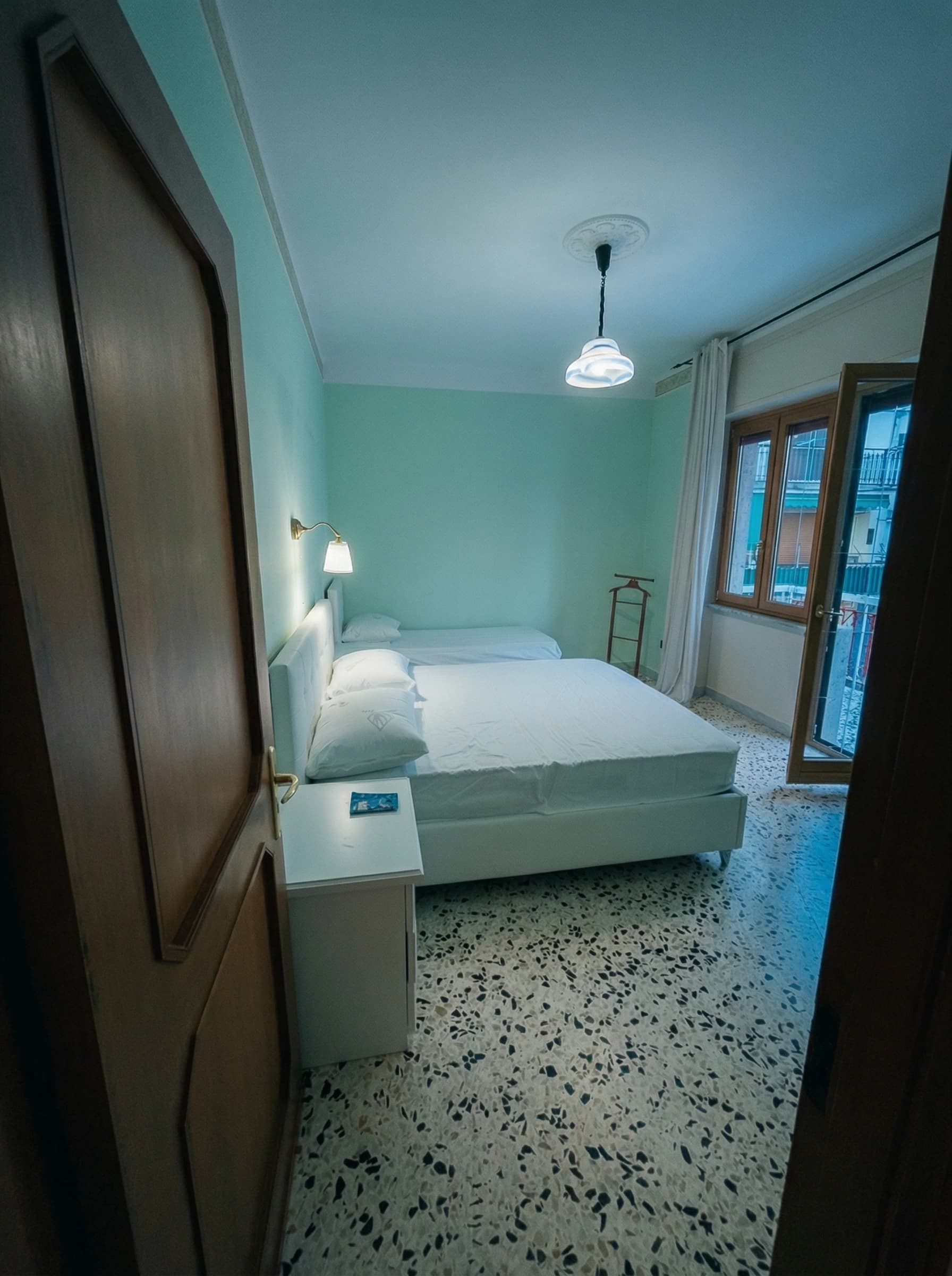 Bedroom with sea-green walls